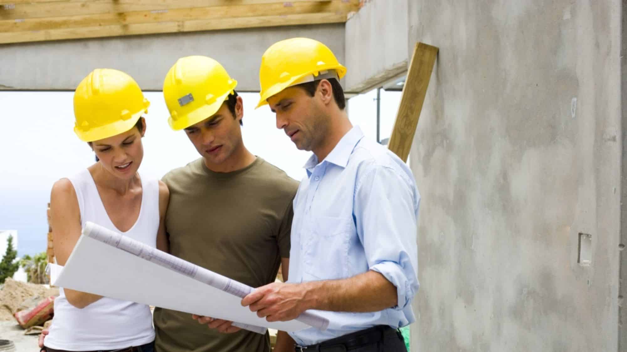 Clients reviewing plans with their Cairns building inspections team.